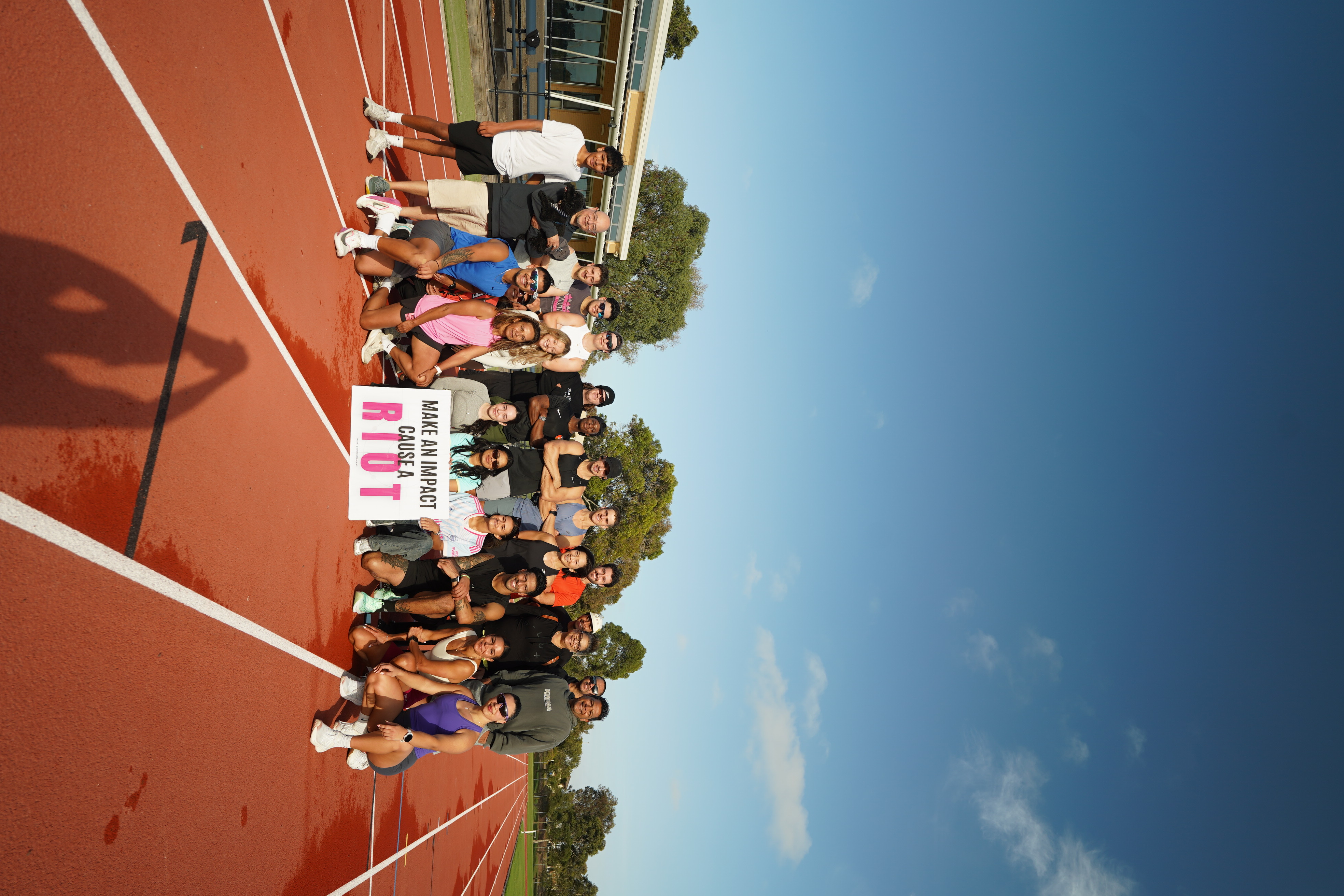 A run club gathered on the track